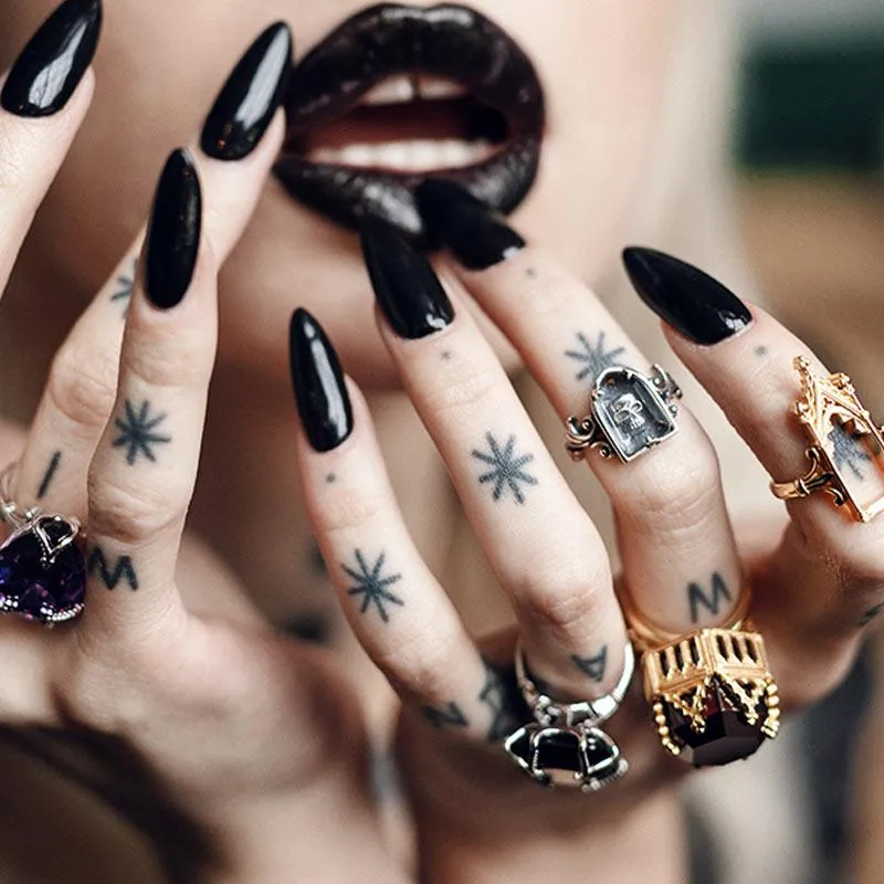 OMINOUS. Skull Under Glass Ring - Gold
