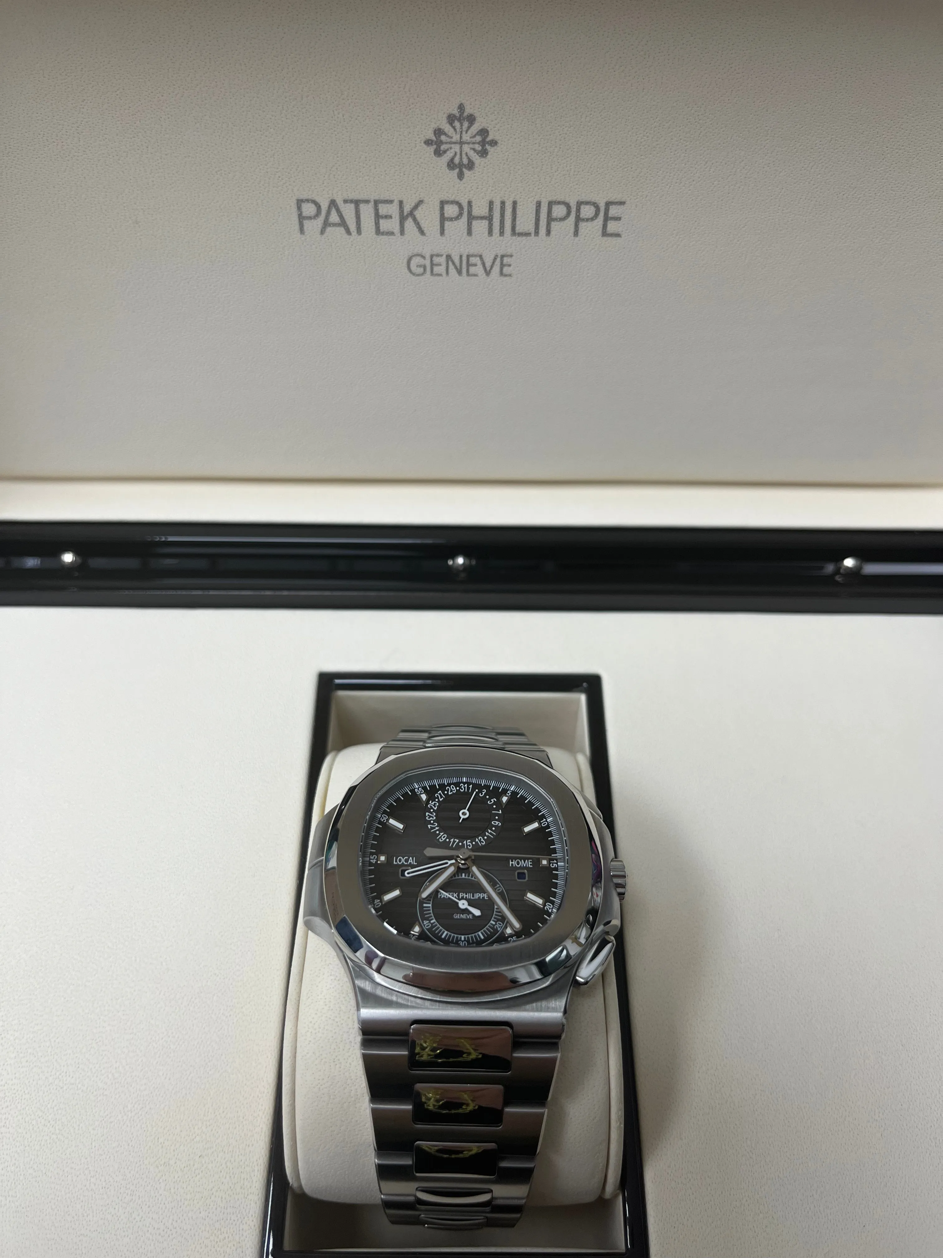 Patek Philippe Nautilus Travel Time Chronograph/ Stainless Steel/ Black Gradated Dial (Ref# 5990/1A-001)